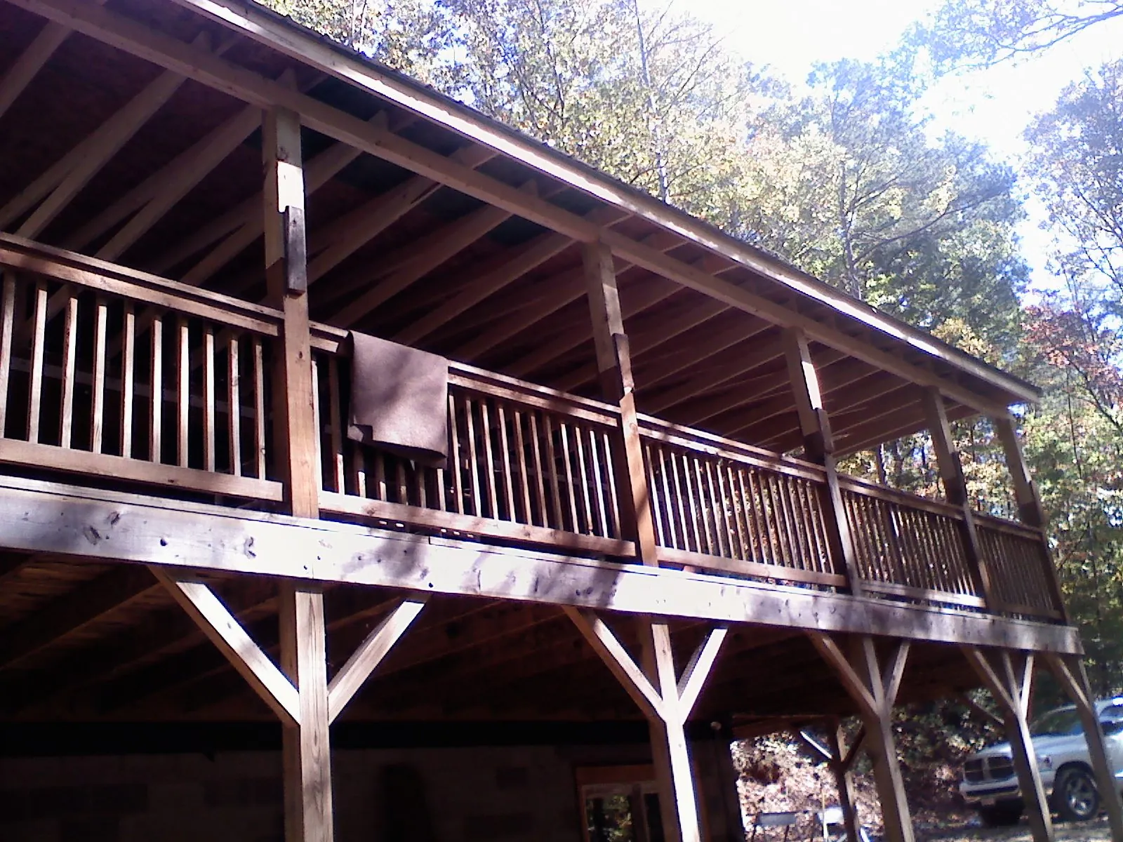 Timber framing under a new elevated porch and deck — Roof Leak Repair in Tolono by Roofing Brothers